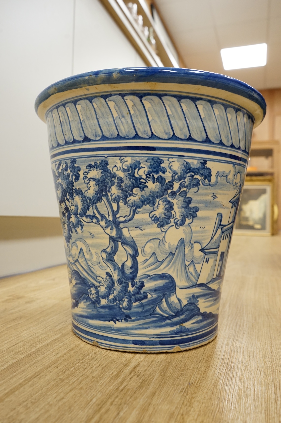 A maiolica glazed planter, 30cm high